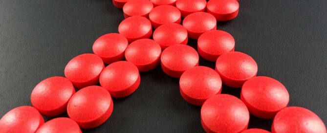 Pills lined up in the shap of an "X"