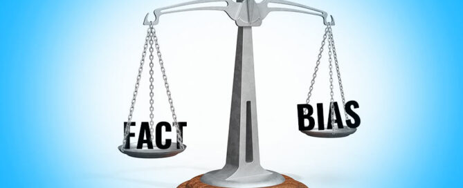 Scale of Justice with the word "Fact" on the left and the word "Bias" on the right