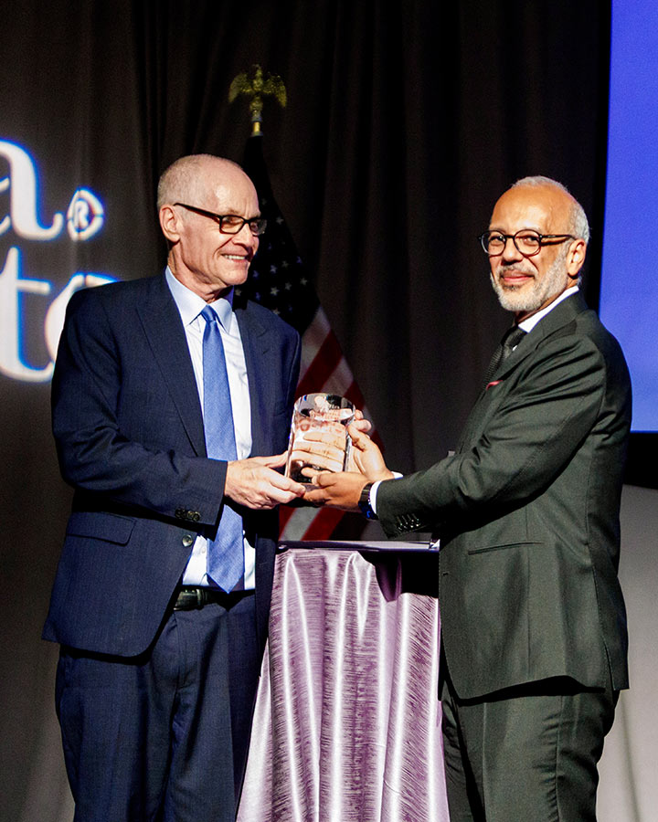 Jack Abernethy accepts American Horizon Award Jack Abernethy (left) accepts American Horizon Award from Mo Elleithee